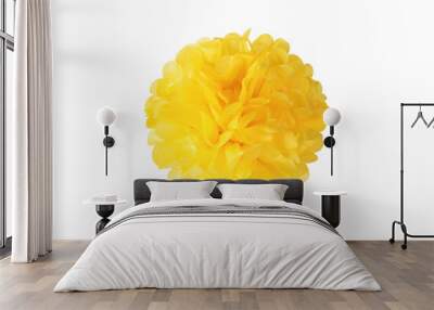 A large yellow paper pompom isolated on a white background. Wall mural