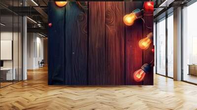 Festive Christmas Lights on Wooden Background with Pine Branches Wall mural