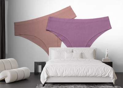 Women's beige and purple panties isolated on a white background. The concept of women's underwear. Wall mural