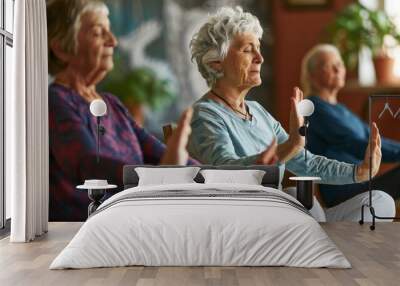 A group of seniors practicing chair yoga in a community center, finding strength and flexibility in gentle movements Wall mural