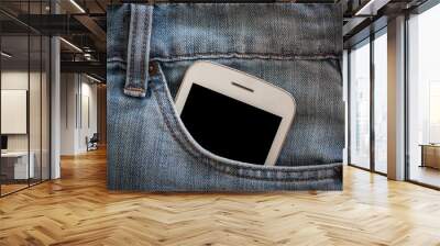 mobile phone in jeans pocket with black screen Wall mural