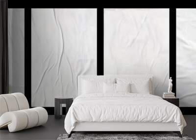 white crumpled and creased glued paper poster set isolated on black background Wall mural