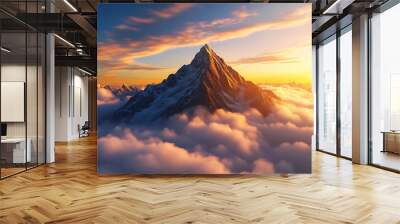 Majestic mountain peak above clouds during sunset, vibrant colors in the sky Wall mural