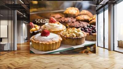 A variety of different pies in a display window for sale; delicious, gourmet pastries Wall mural