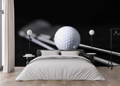 Black background, golf balls and clubs. Wall mural