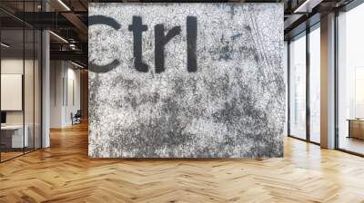 Grunge graffiti depicting the Ctrl key Wall mural