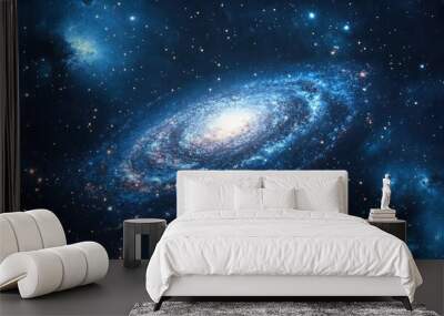 A captivating blue galaxy background with twinkling stars and cosmic dust, ideal for creating a sense of infinity and mystery Wall mural