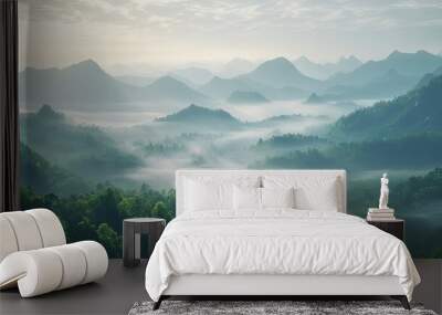 A stunning panorama of wild nature in the mountains, bathed in soft morning light, with rolling hills and misty peaks. Wall mural