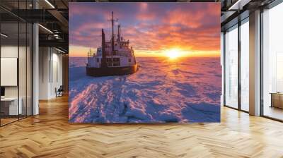 An icebreaking vessel plowing through Arctic ice as the sun rises on the horizon, casting warm light over Wall mural