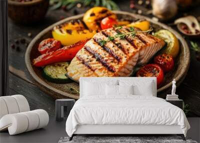 Grilled salmon fillet with assorted vegetables, arranged on a rustic plate, ideal for healthy dining and organic food ads Wall mural