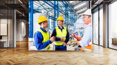 Asian factory worker and engineer as team Wall mural