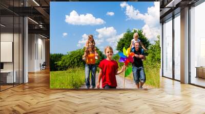 Family walking down that summer path Wall mural