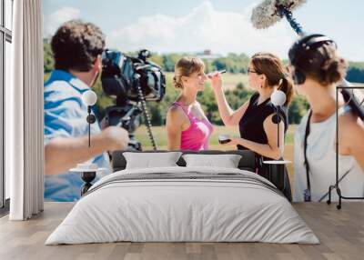 Model in the make-up during video shoot on production set Wall mural