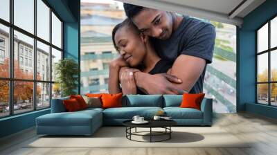 Portrait of young African American couple in love posing togethe Wall mural