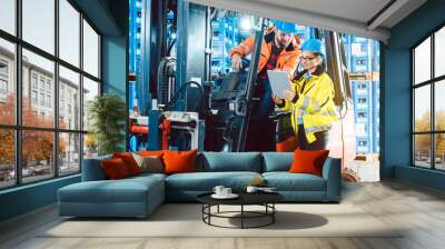 Workers in logistics warehouse checking the inventory Wall mural