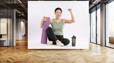 Full body image of young Asian girl wearing sports clothes and posing on white background Wall mural