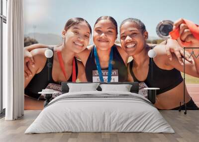 Fitness, woman and friends with smile for medal, winning or victory in running sport at the stadium together. Group of athletic women smiling in celebration for trophy winner, marathon or achievement Wall mural