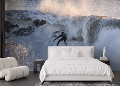 Tow in surfer catching giant tubing wave in Santa Barbara Wall mural