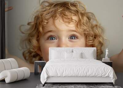 Joyful Young Child with Curly Hair  Wall mural