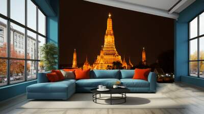 Wat Arun by night in Bangkok. Kingdom of Thailand. Wall mural