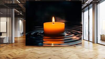 Floating candle with reflection on water, tranquil Wall mural