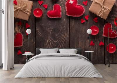 Arrangement Valentine's day. Many different bright hearts, red aromatic candles Wall mural