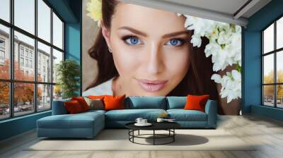 Portrait of Beautiful Young Woman in Flowers. Healthy Clear Skin Wall mural