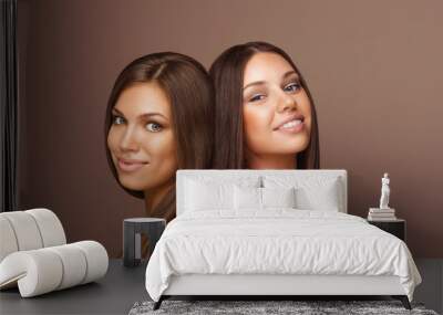 Portrait of two Beautiful Women with Long Hair and Clean Skin Wall mural