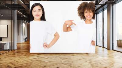 Asian and african american women in blank white t shirt isolated on white background. Multi ethnic and multination concept. Set of template summer clothes tshirt. Copy space. Front view Wall mural