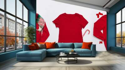 Close up banner red blank template sweatshirt, hoodie, t shirt with copy space and Christmas Holiday concept. Top view mockup. Holidays decorations on white background. Happy New Year clothes. Xmas Wall mural