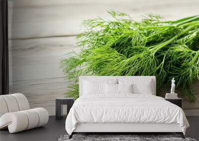 a bunch of fresh dill leaves herb on a wooden surface Wall mural