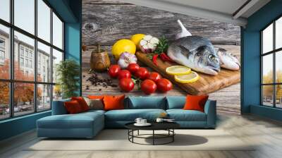 Raw fish with vegetables, ready to cook. Dorada fish  Wall mural