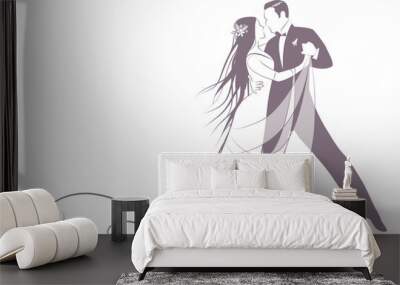 Elegant groom and beautiful bride with long mane dancing the wedding dance Wall mural