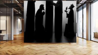 Nativity scene silhouette with reflection on the table Wall mural