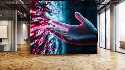 A digital hand composed of pixels reaching out towards a physical hand, representing the merging of the physical and digital worlds in the concept of digital transformation Wall mural