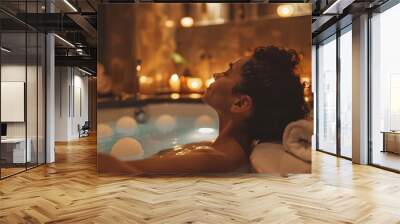 A person enjoying a soothing bath with candles, bath salts, and soft music playing Wall mural