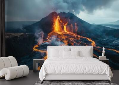 Volcano erupting with lava flowing down its slopes Wall mural