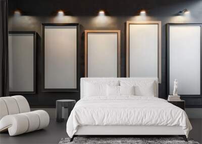 Five mismatched frames on a charcoal grey wall, with spotlights casting a warm glow, creating a modern art display in Wall mural