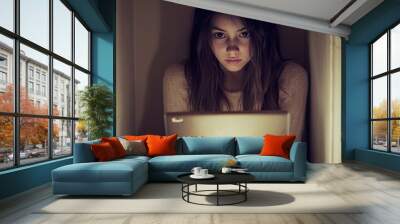 Teen girl using laptop Wall mural