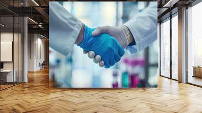 Science handshake and agreement in laboratory for success deal or gratitude Teamwork medical research and scientist shaking hands in gloves for partnership collaboration or welcome for doctors Wall mural