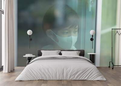 Cute children boy and girl in medical mask stay at home Wall mural