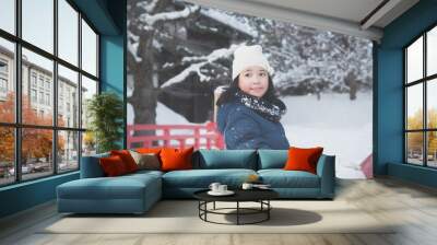 Portrait of beautiful Asian girl on red bridge at Hirosaki Castle in Aomori, Japan Wall mural