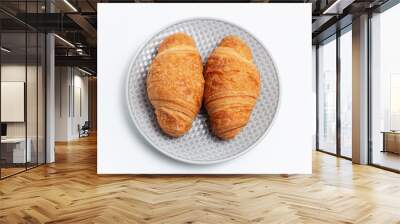 Close-up of two croissants in grey plate on white background. Wall mural