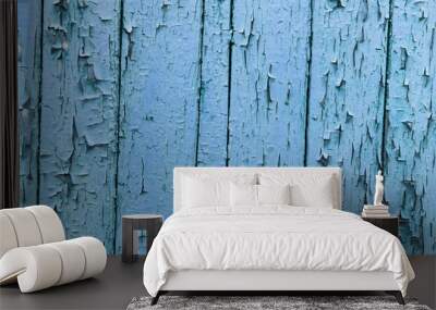 Natural abstract background of textured cracked wooden wall of blue color. Wall mural