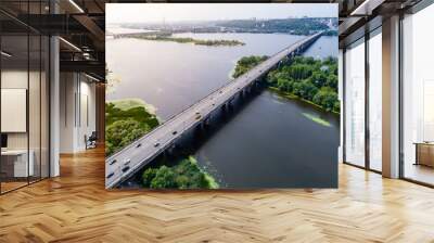 Aerial view of the bridge and the road over the Dnepr River over a green island in the middle of the river. Kiev, Ukraine Wall mural