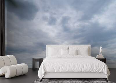 Cloudy gray sky with thick dense clouds. Wall mural