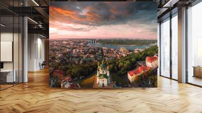 Panorama of the city of Kiev with the domes of St. Andrew's Church in the foreground, the historic district of Podol and the Dnieper River in the background. Cityscape Wall mural