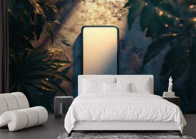  Sleek smartphone rests on textured surface with foliage shadows. Sunlight partially illuminates the device, blending nature with modern technology in a balanced, artistic scene. Wall mural