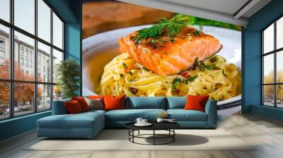 A Mouthwatering Plate of Pasta Topped with a Perfectly Seasoned Piece of Salmon, Enhanced with Fresh Herbs and Spices, Served in a Bowl to Create a Delicious and Appetizing Culinary Experience Wall mural