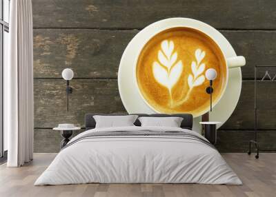 Cup of latte coffee on table Wall mural